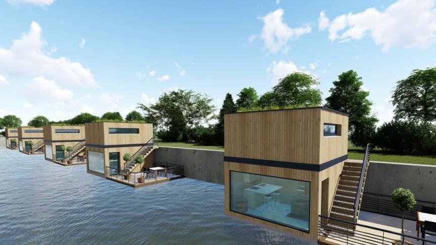 Projection de maisons flottantes en bois, ouvertes sur un canal bordé d’arbres